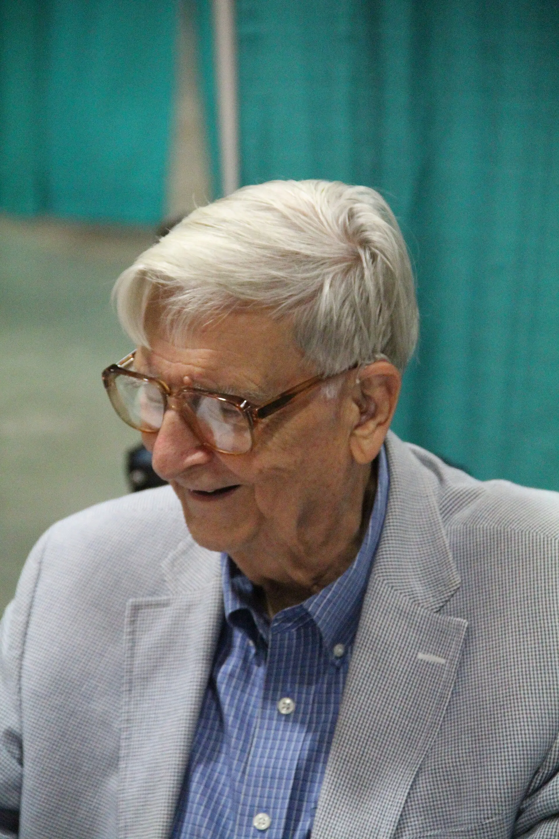 Edward O. Wilson in a grey jacket and glasses