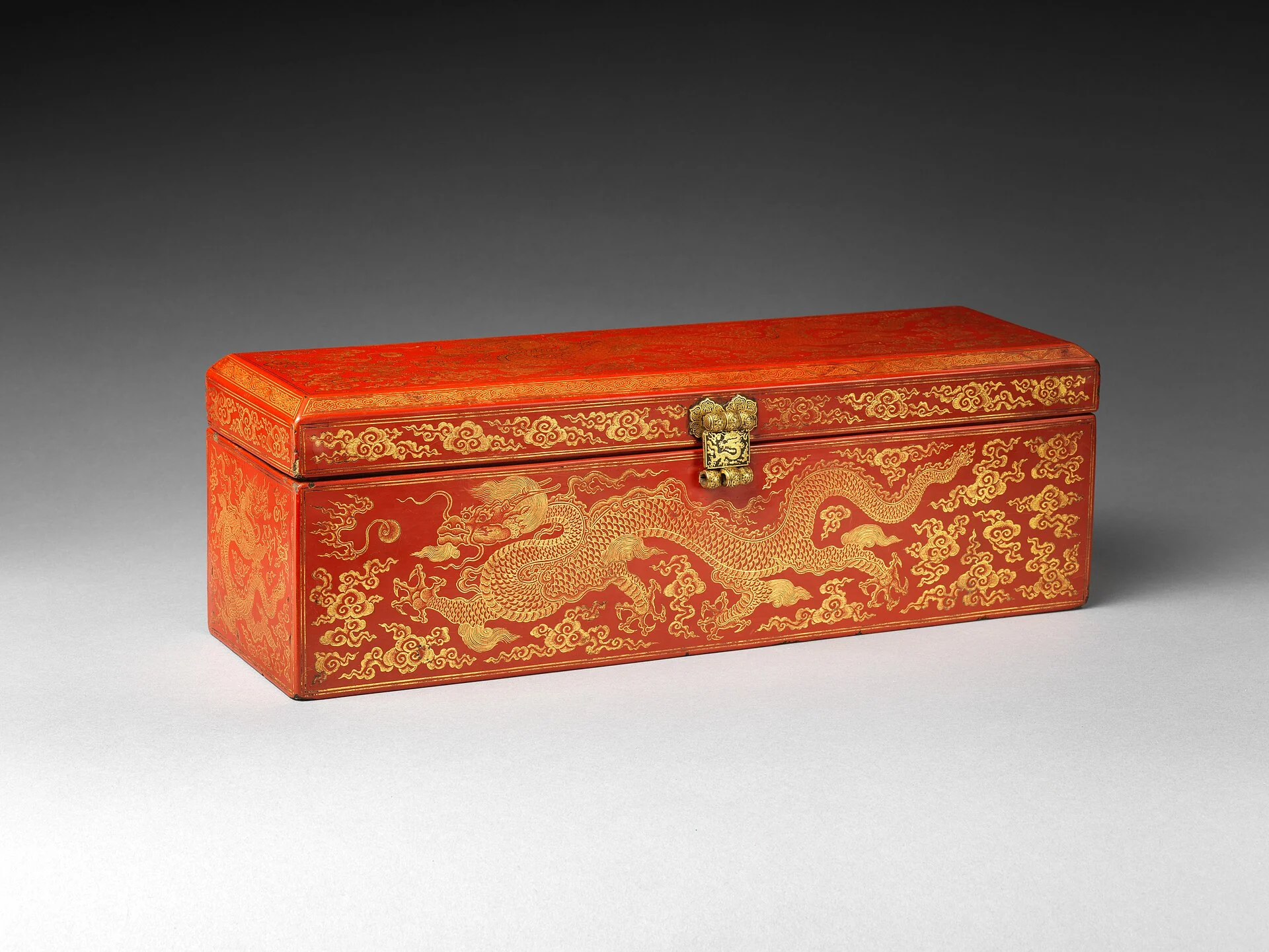 Red lacquer sutra box with gold dragons among clouds, Ming dynasty