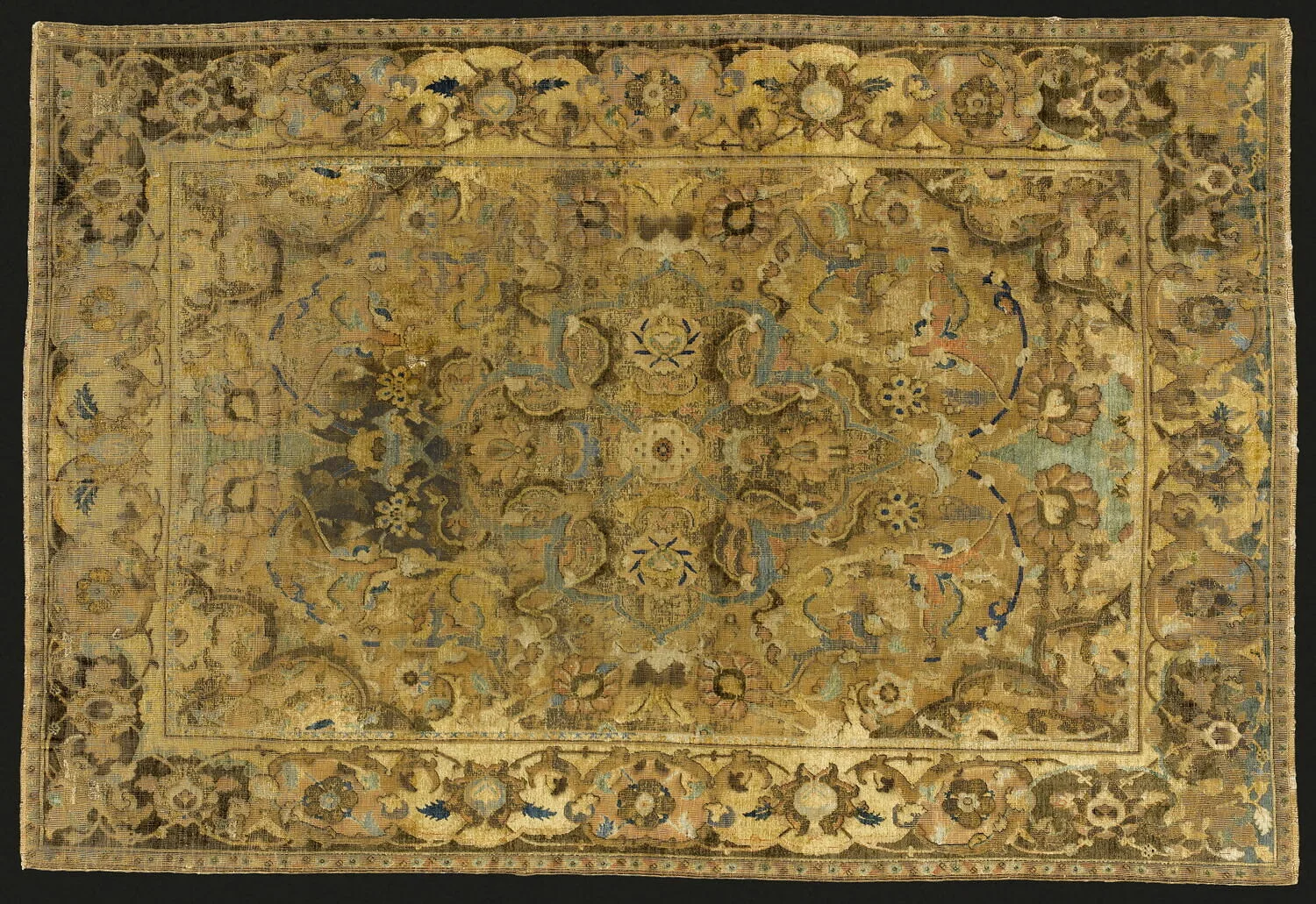 Silk and metal-thread carpet with a gold floral medallion pattern
