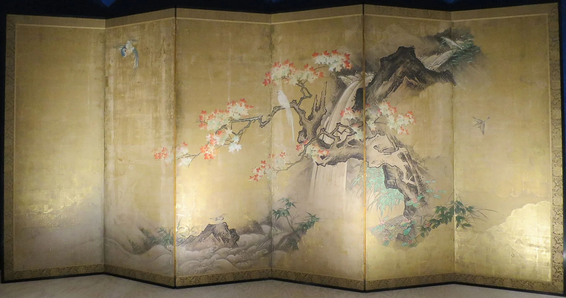 Six-panel folding screen painted with maple trees and birds on gold leaf