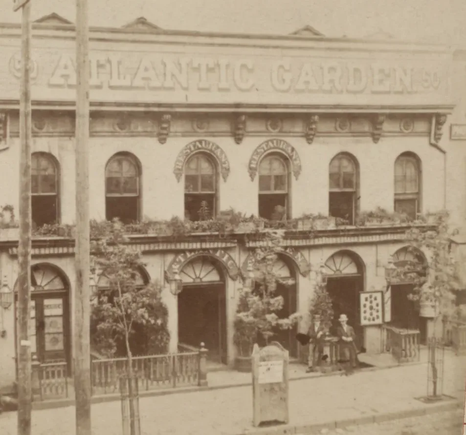 Sepia photograph of a two-storey hall front with Atlantic Garden lettering
