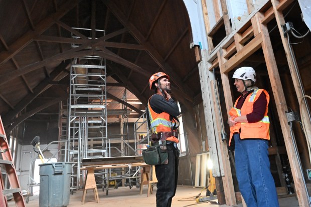 Connor Harvard of Cahill Contractors chats with Ellyn Weisel, executive director of WildCare, at the nonprofits's historic 19th century building under renovation in San Rafael, Calif., on Monday, Feb. 9, 2026. (Alan Dep/Marin Independent Journal)