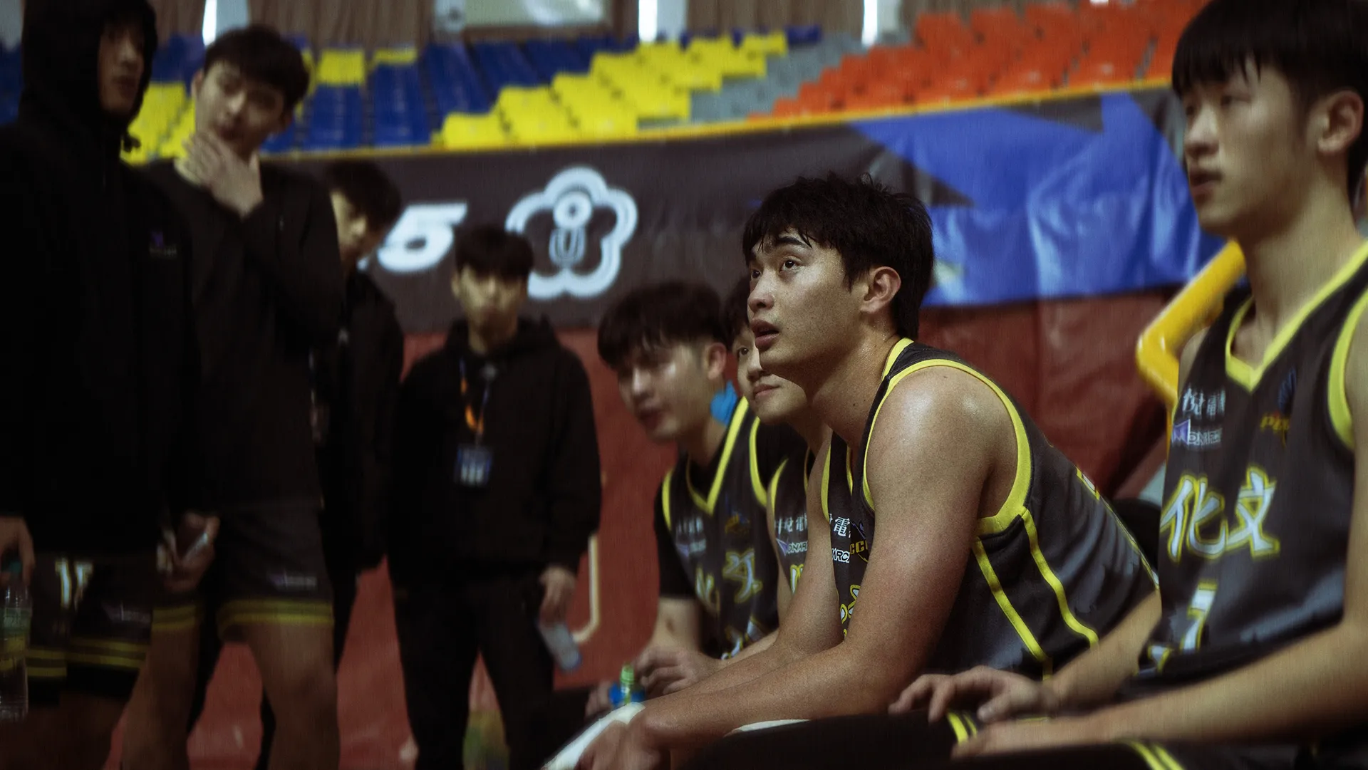 Close-up of basketball players during a game discussion