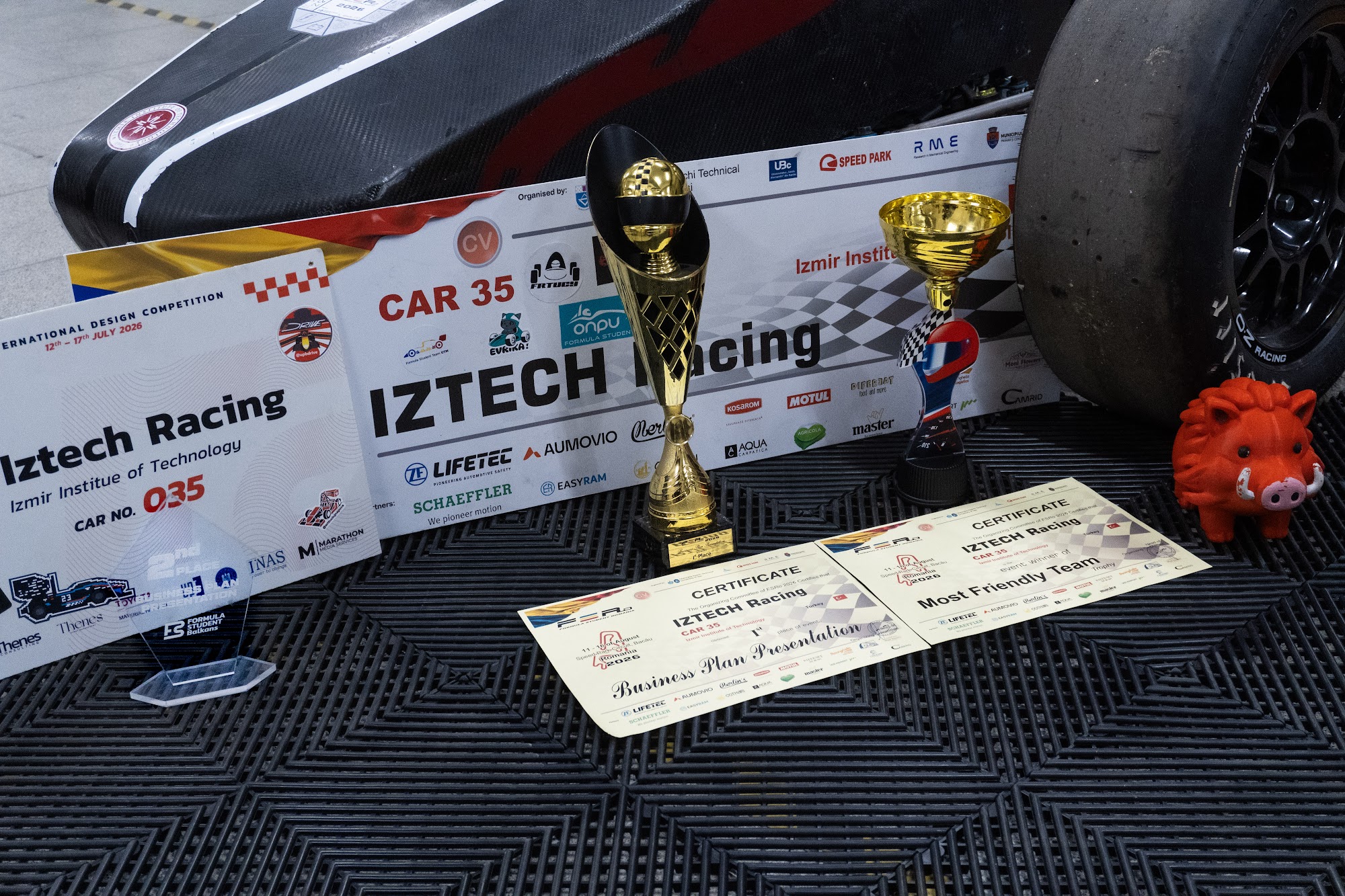 IZTECH Racing trophies and certificates from Formula Student Romania: Business Plan Presentation and Most Friendly Team