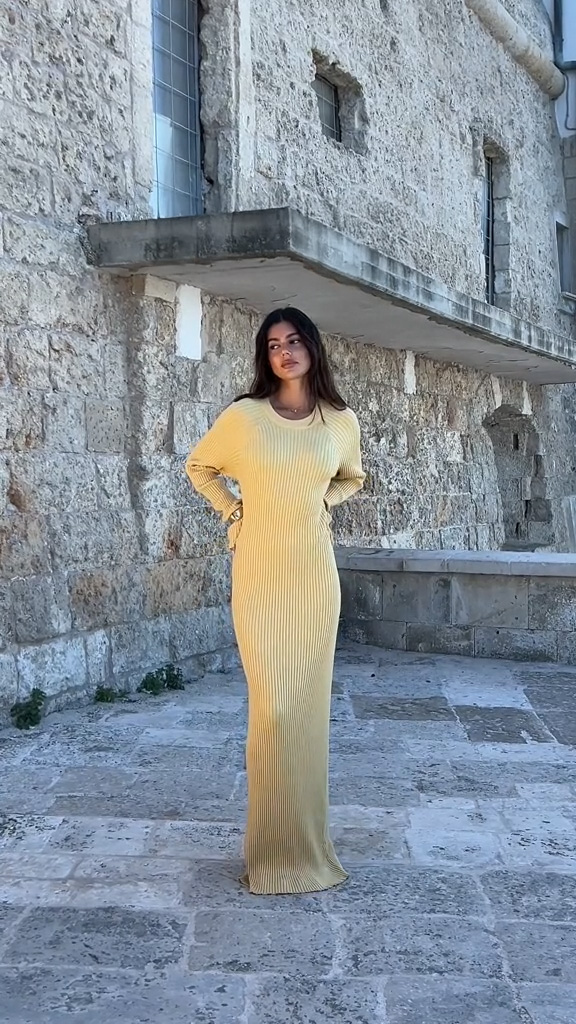 Image of a model wearing a yellow dress
