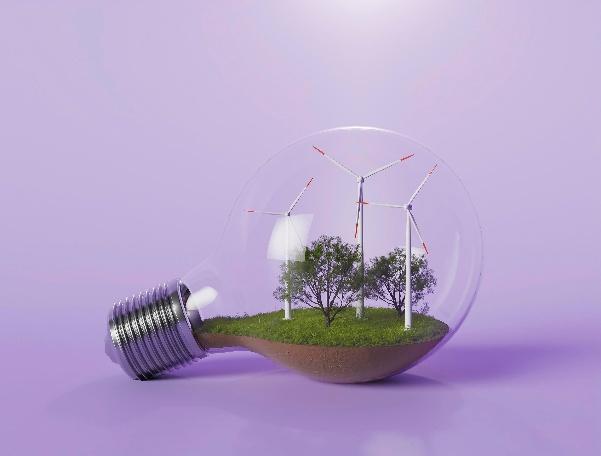 A light bulb with a tree and wind turbines insideAI-generated content may be incorrect.