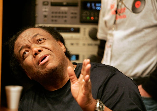 Legendary Motown producer/songwriter Lamont Dozier sings along with Freda Payne's song "Betcha By Golly Wow" during a recording session by Soul Renaissance Records at Studio A in Dearborn Heights in 2006.