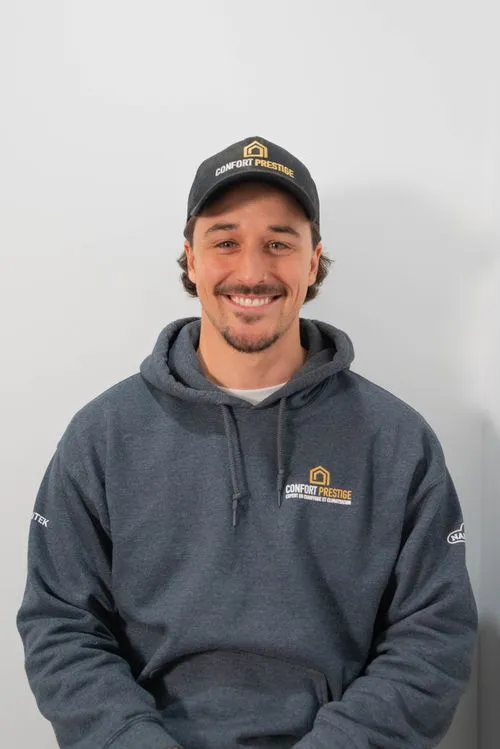 A man wearing a Comfort Pride hoodie.