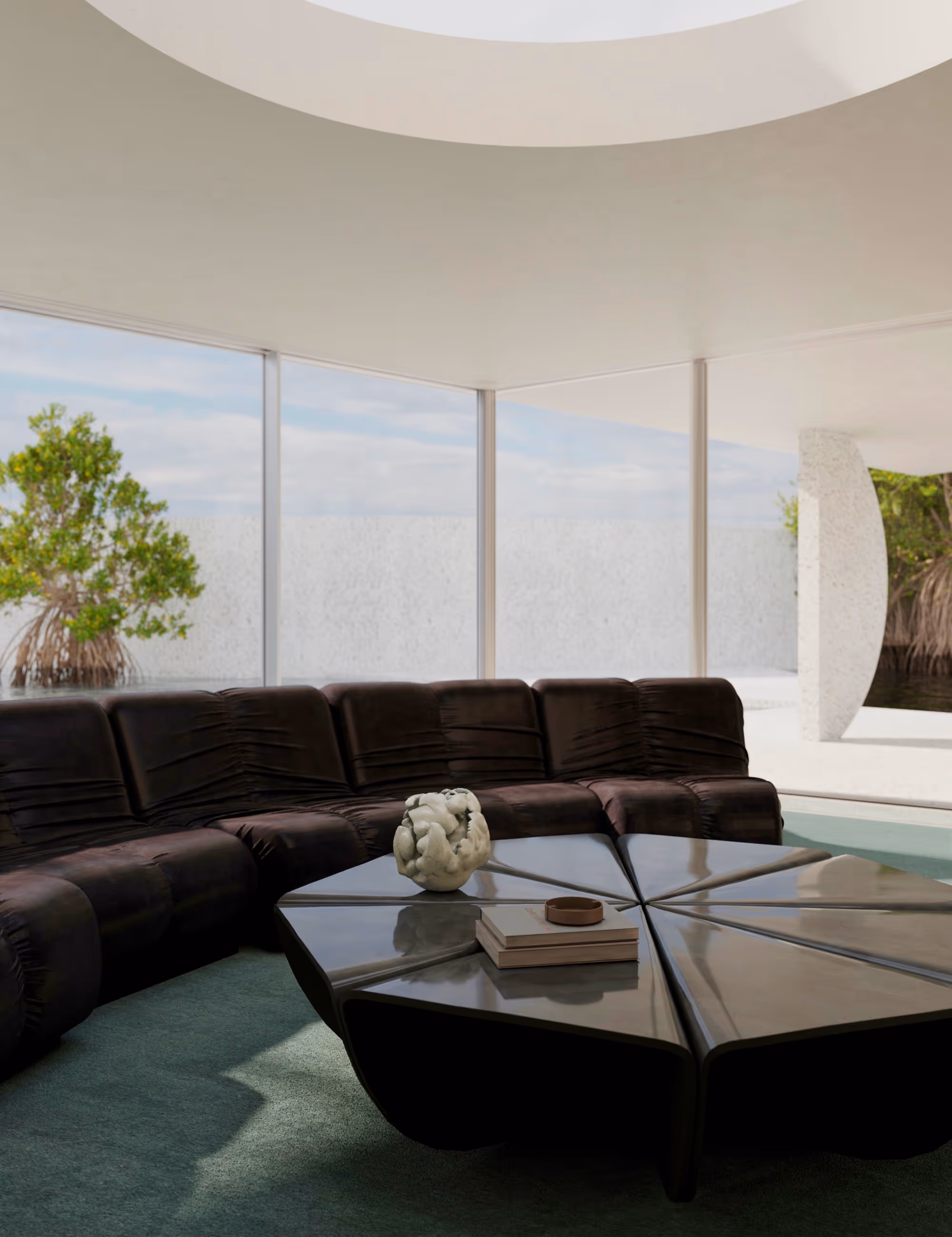 Alternate view of living room highlighting the Fen Sofa and custom ceramic coffee table inspired by seed pod geometry. {vertical}