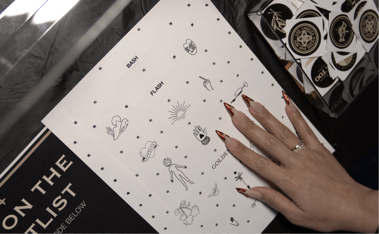 Couple getting matching tattoos as part of their wedding celebration, creating a unique keepsake at their special event.