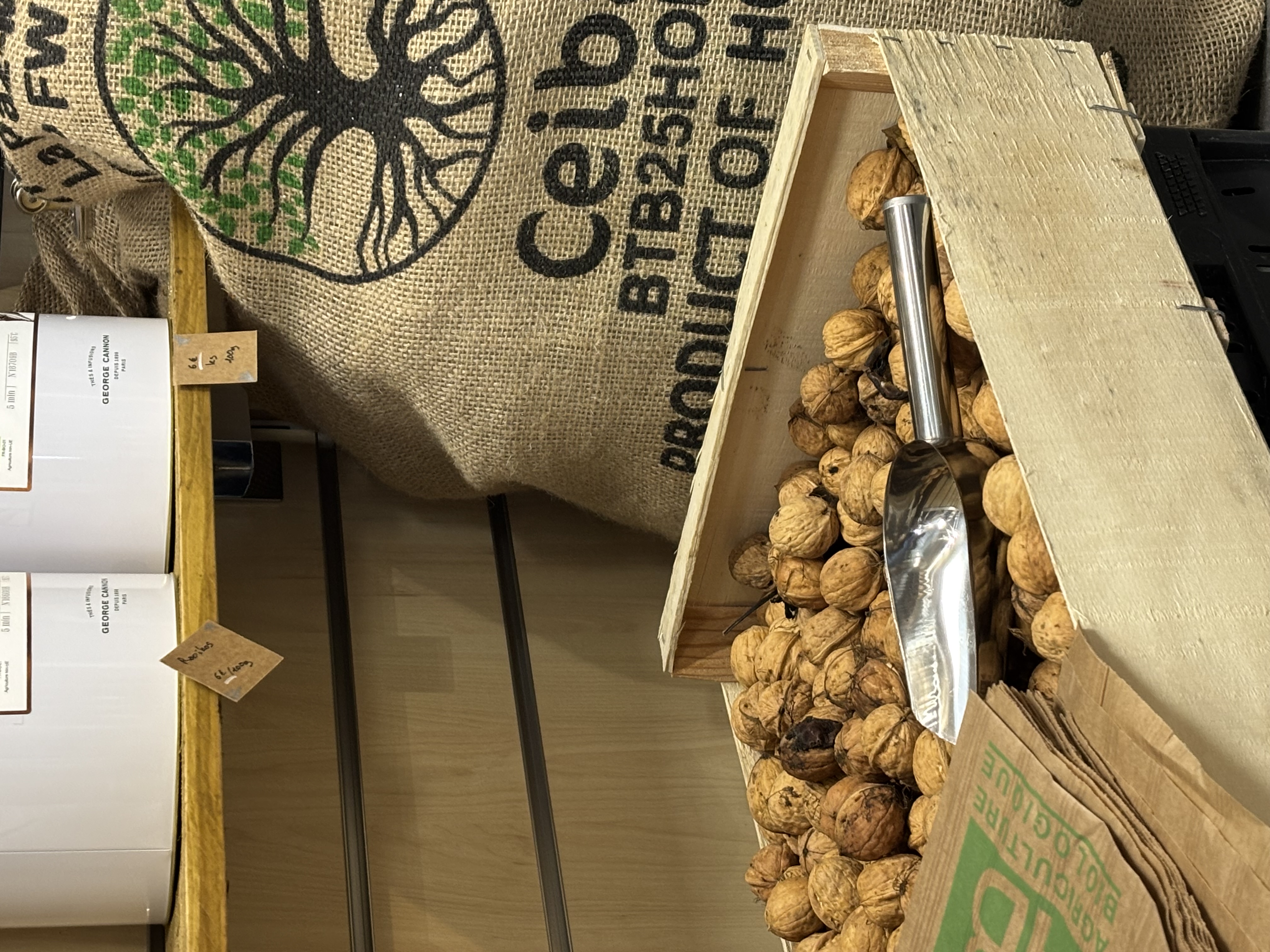 Positive young multiracial friends eating fast food and drinking beer in outdoor cafe