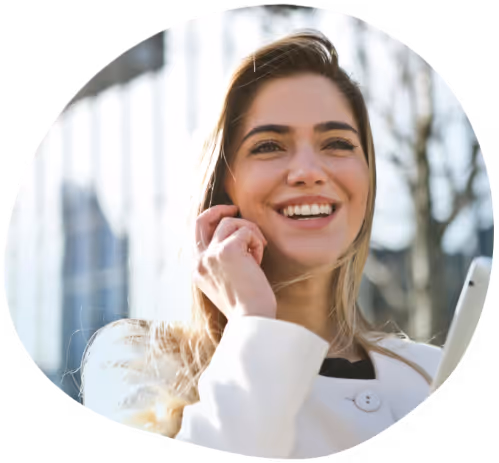 Happy justiciae customer talking with one of our agents by a phone