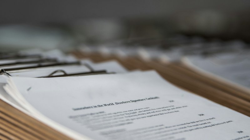 white printer paper close-up photography, possibly many people write LOI grants