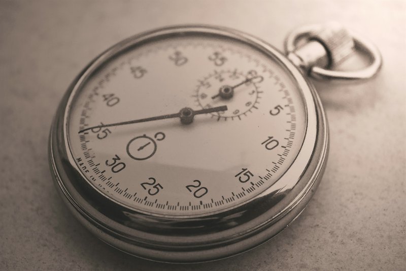 a stopwatch symbolizing grant writing efficiency and time savings