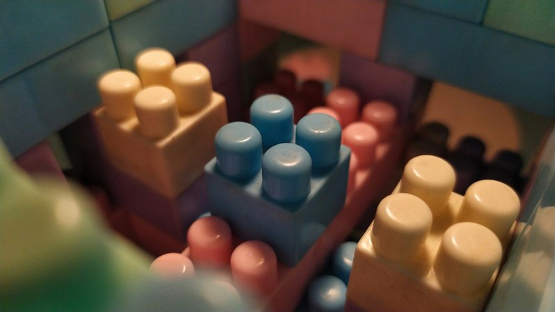 building blocks stacked on top of each other symbolizing how meeting grant reporting requirements can lead to relationship development