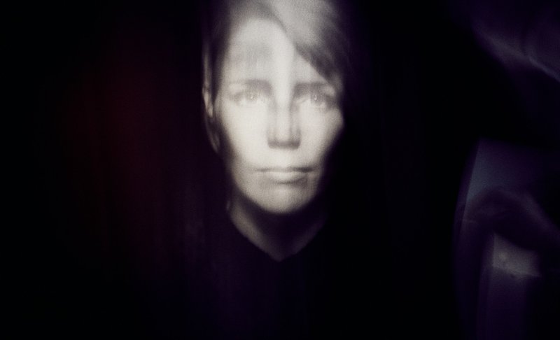 a blurry image of a woman&#39;s face symbolizing the tendency for careless AI use to deviate from authentic AI writing