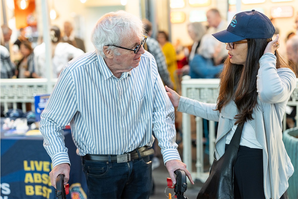 PCLA community members talking at a PCLA event