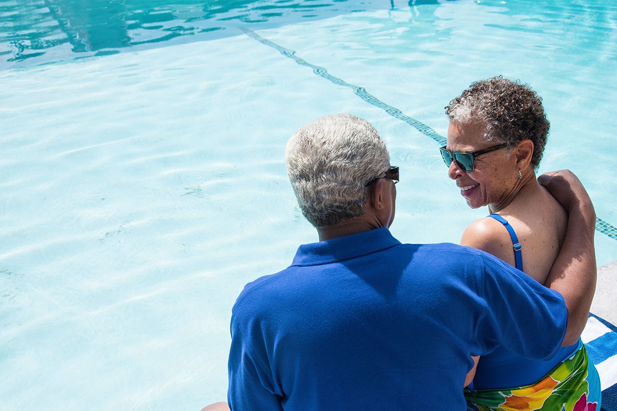 A couple by the pool