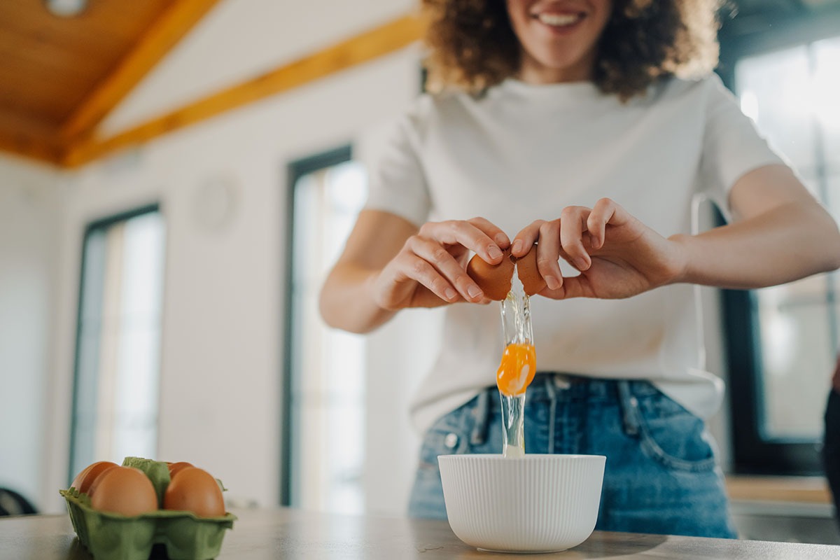 woman making eggs