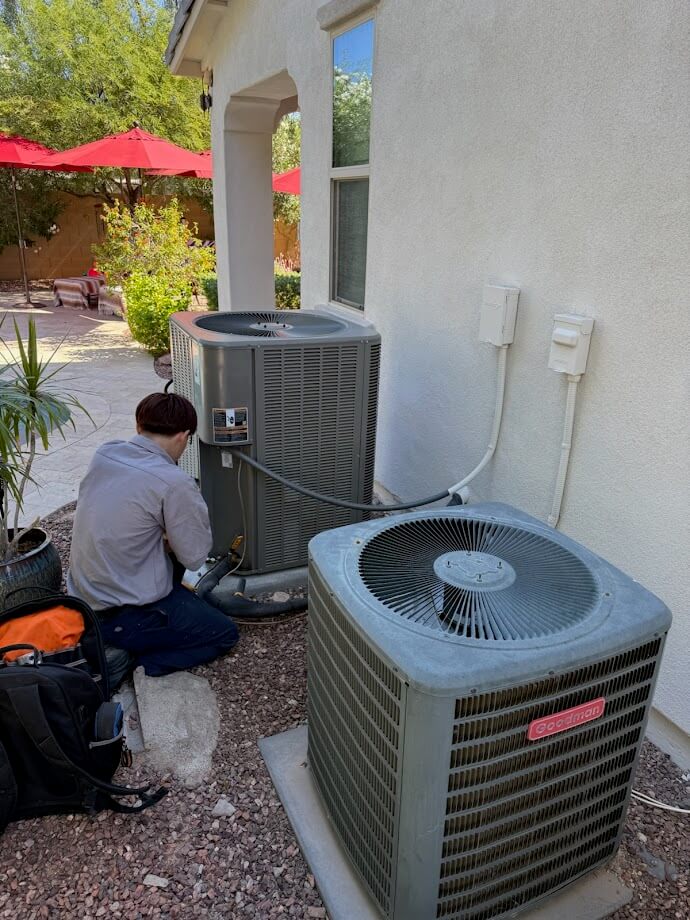 Technician working with HVAC unit