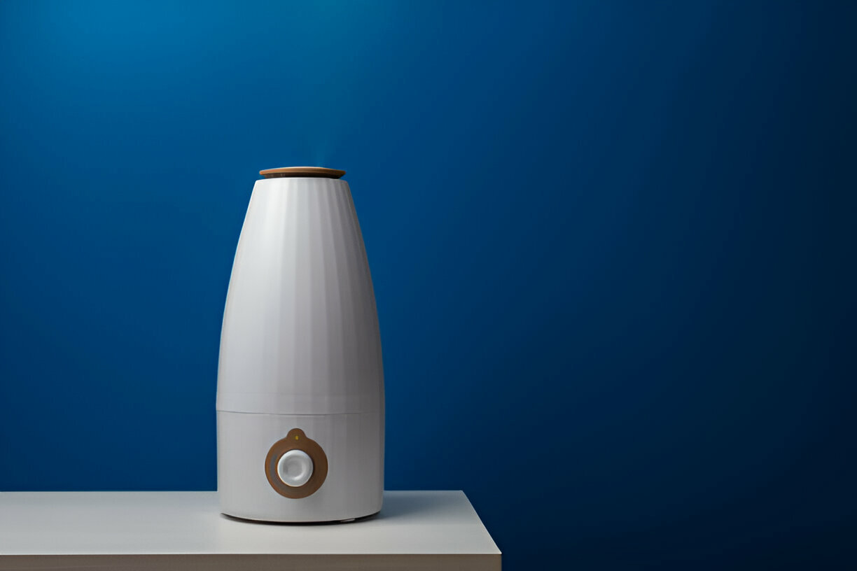 White modern humidifier with wooden top on blue gradient background