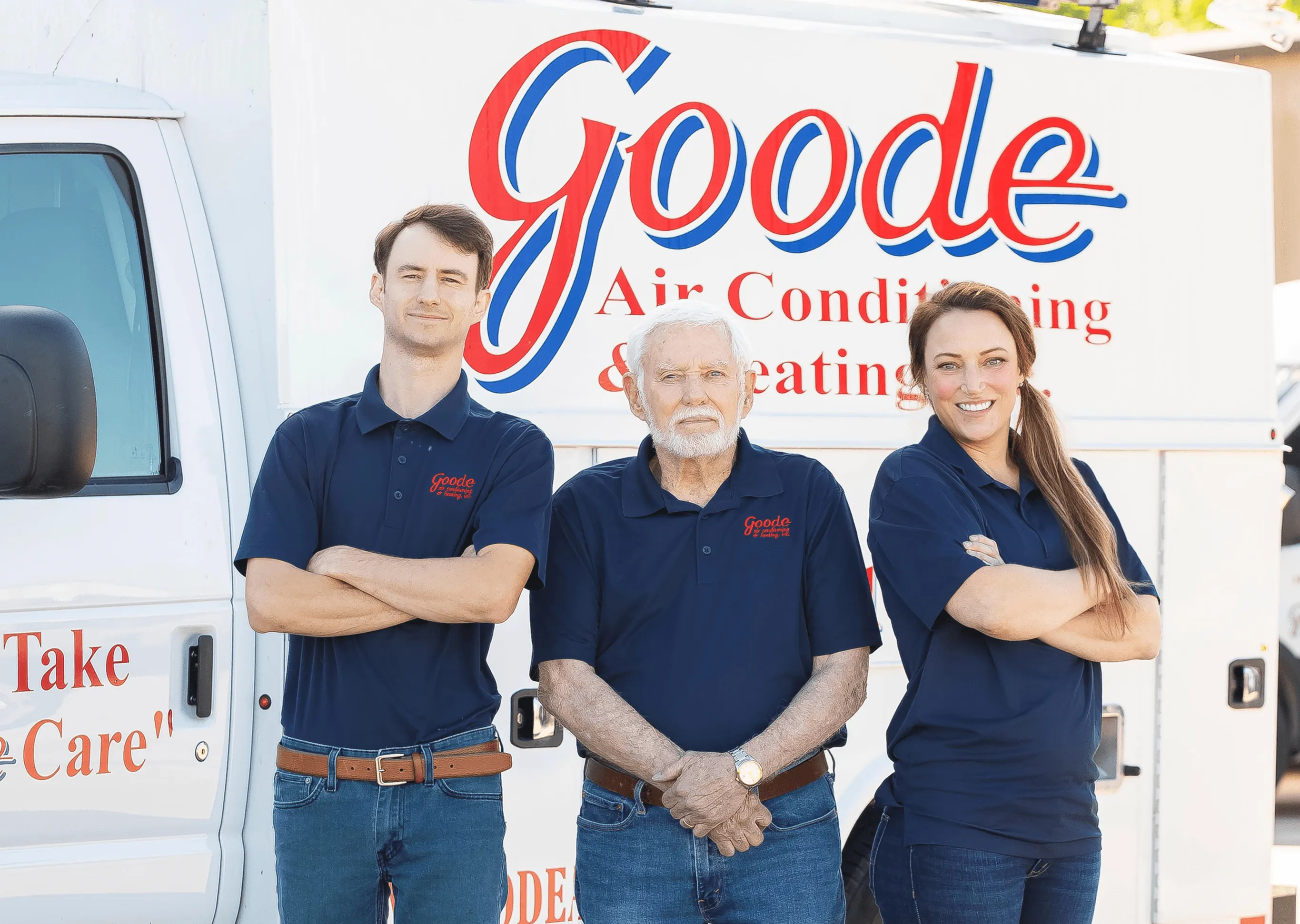 Goode Air Conditioning team posing in front of company van