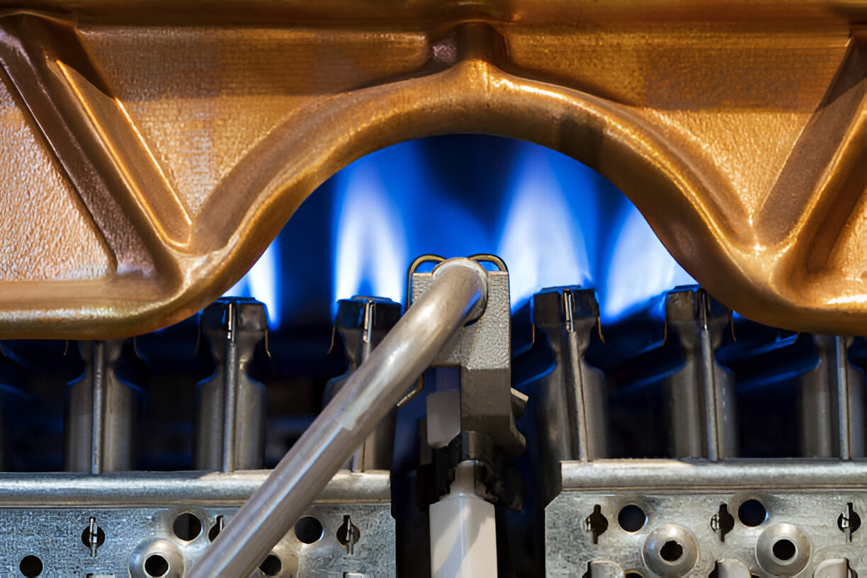 Blue gas flames burning in a complex mechanical engine component