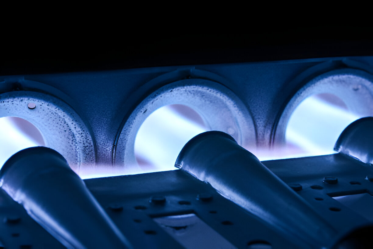 Blue-tinted industrial machinery with glowing circular components