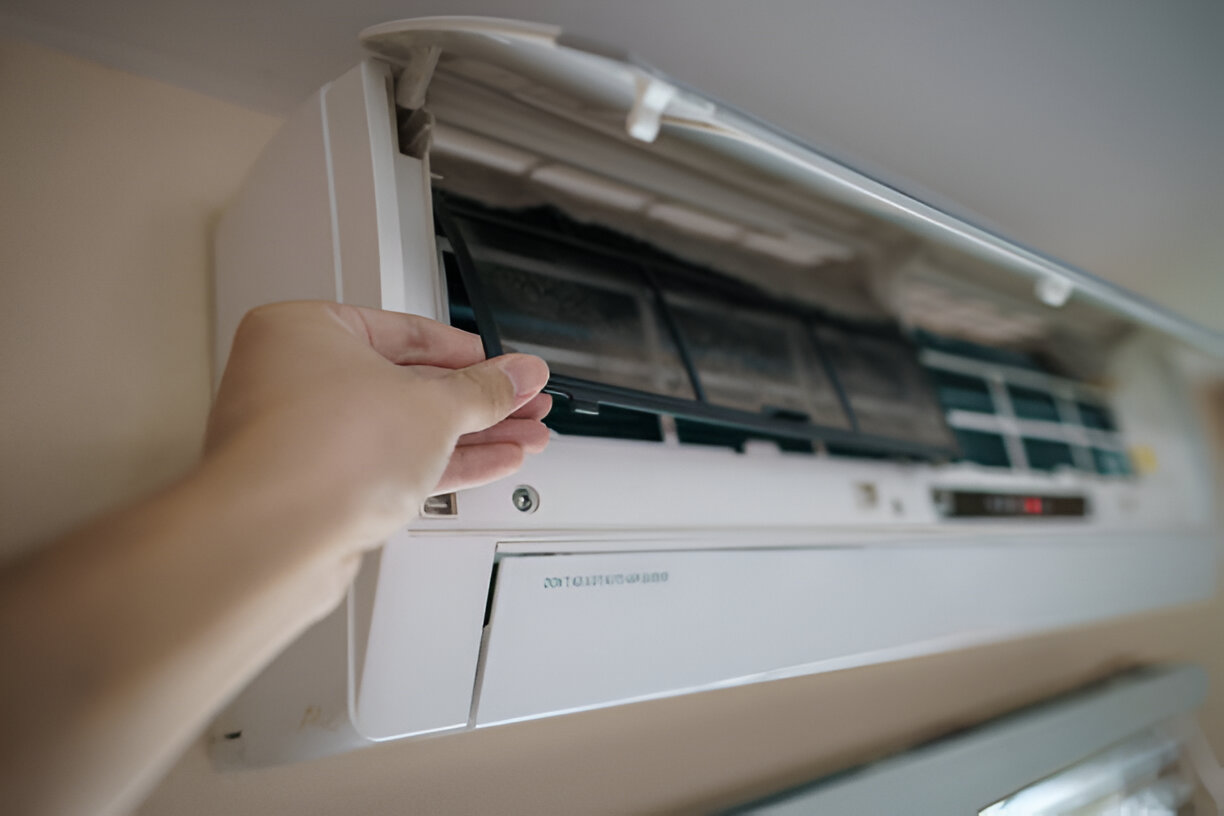 Hand opening air conditioning unit, showing interior and vents