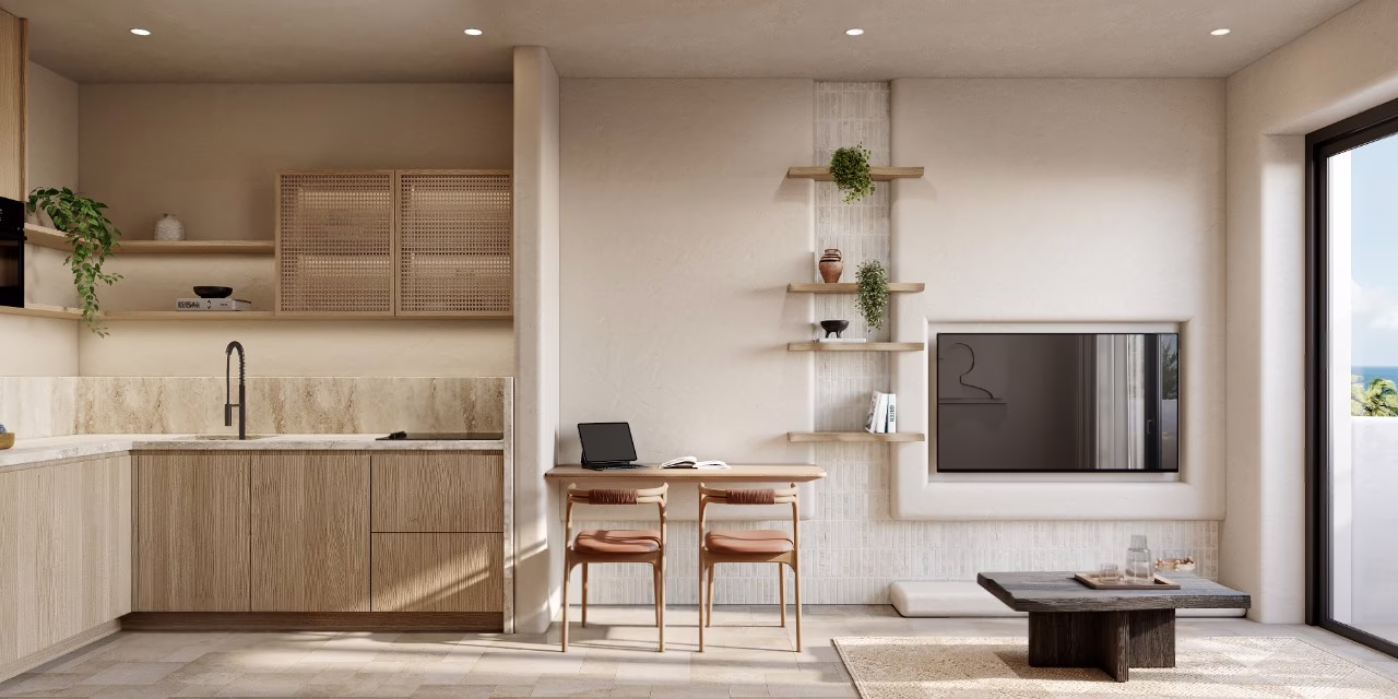 Studio apartment at Azure Paje: fitted kitchen, desk and living corner in warm natural tones