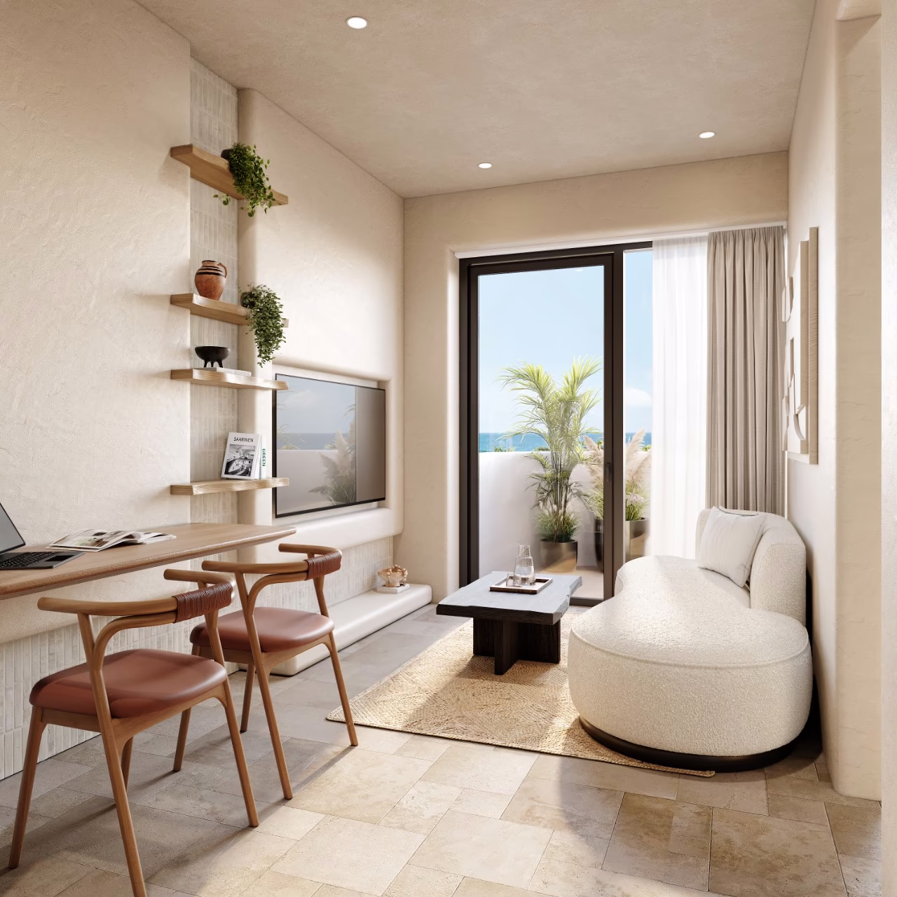 Studio apartment at Azure Paje: living area with a curved sofa, work desk and glass doors to the balcony