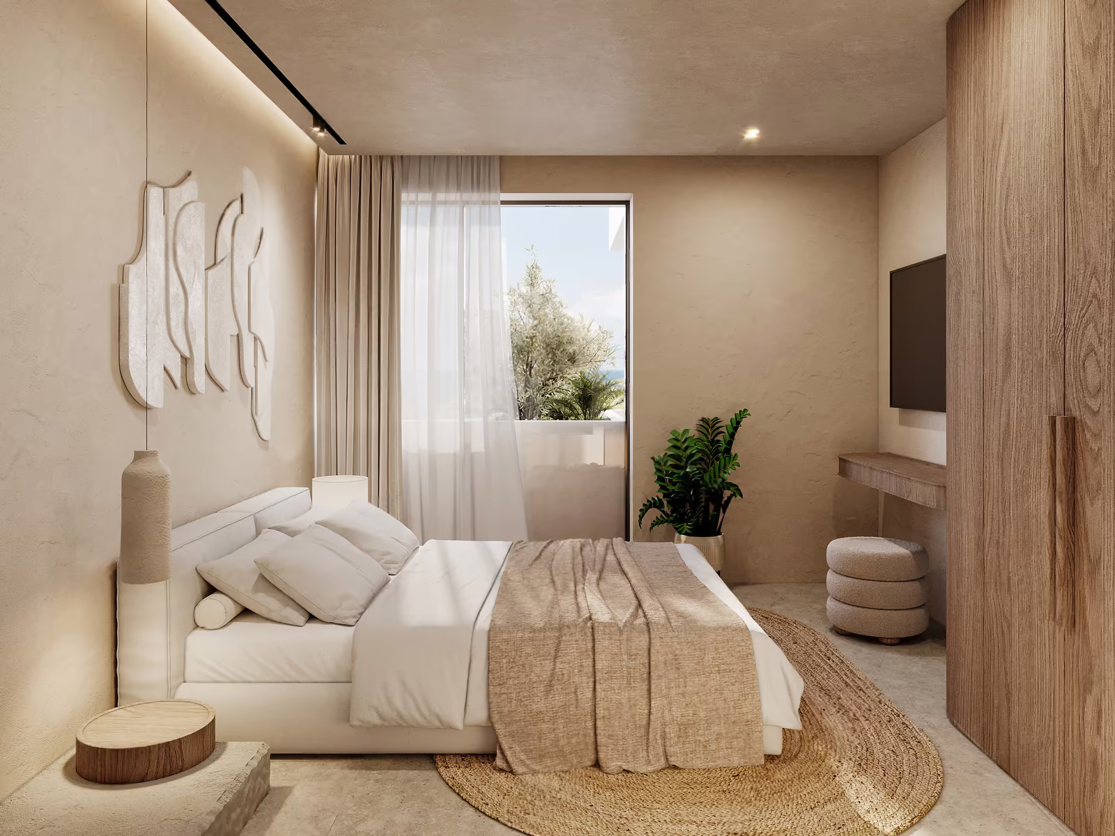 Two bedroom apartment at Azure Paje: bedroom with a double bed, wardrobe and garden view