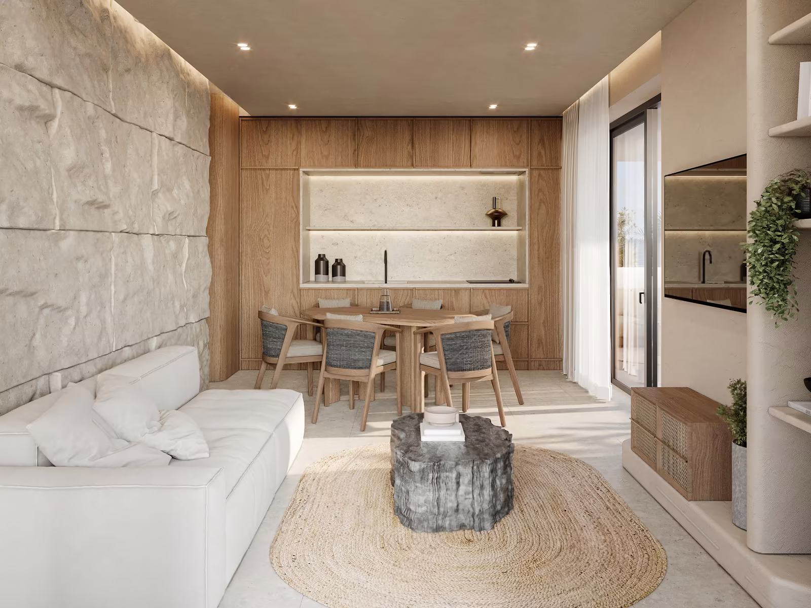 Two bedroom apartment at Azure Paje: living room with a sofa and a dining table by the kitchen