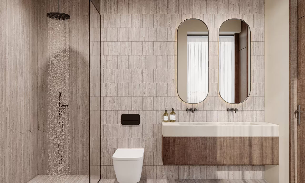 2 Bedroom Penthouse at Azure Paje: bathroom with twin mirrors, a stone basin and walk-in shower