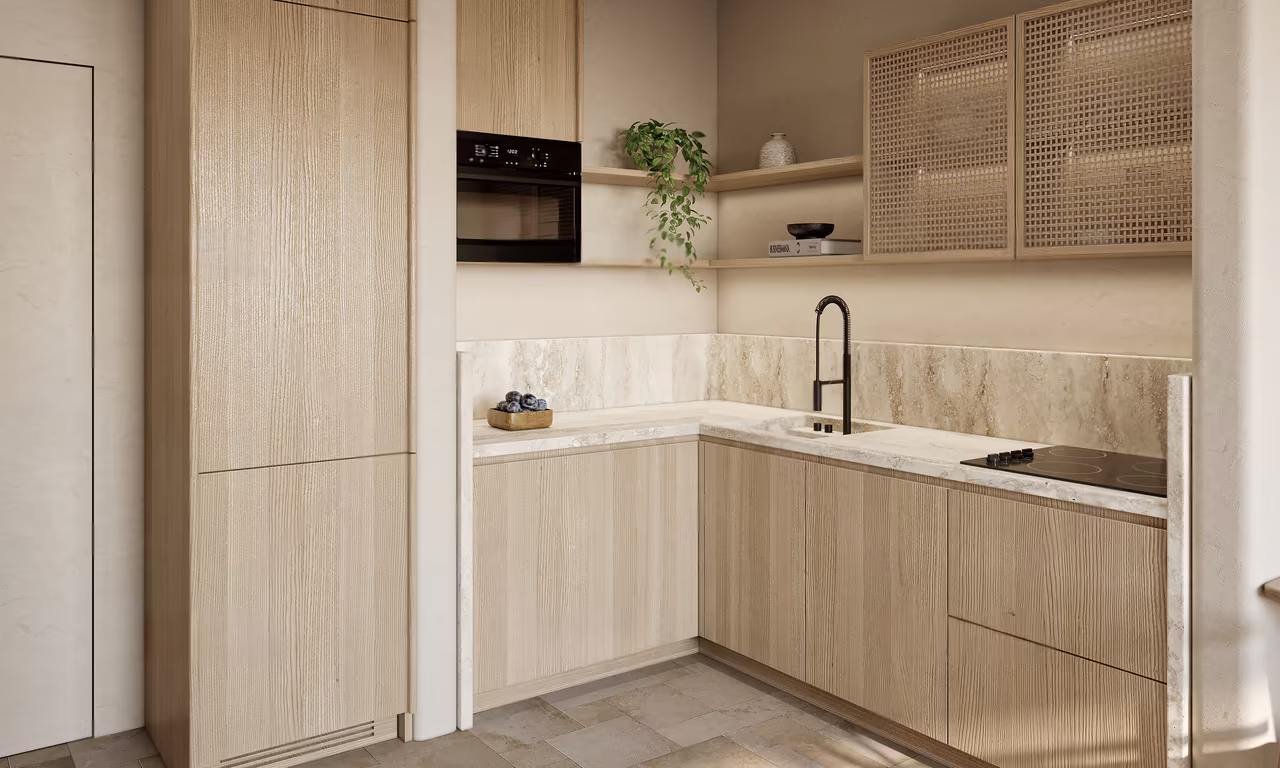 Studio apartment at Azure Paje: fitted timber kitchen with a built-in oven and stone worktop
