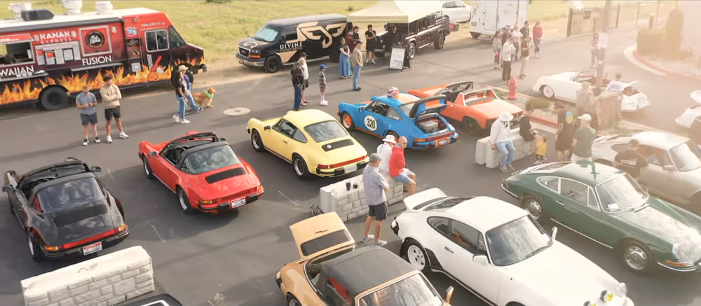 Porsche Idaho Air 2026 sponsor and partner event with classic Porsche vehicles and attendees.