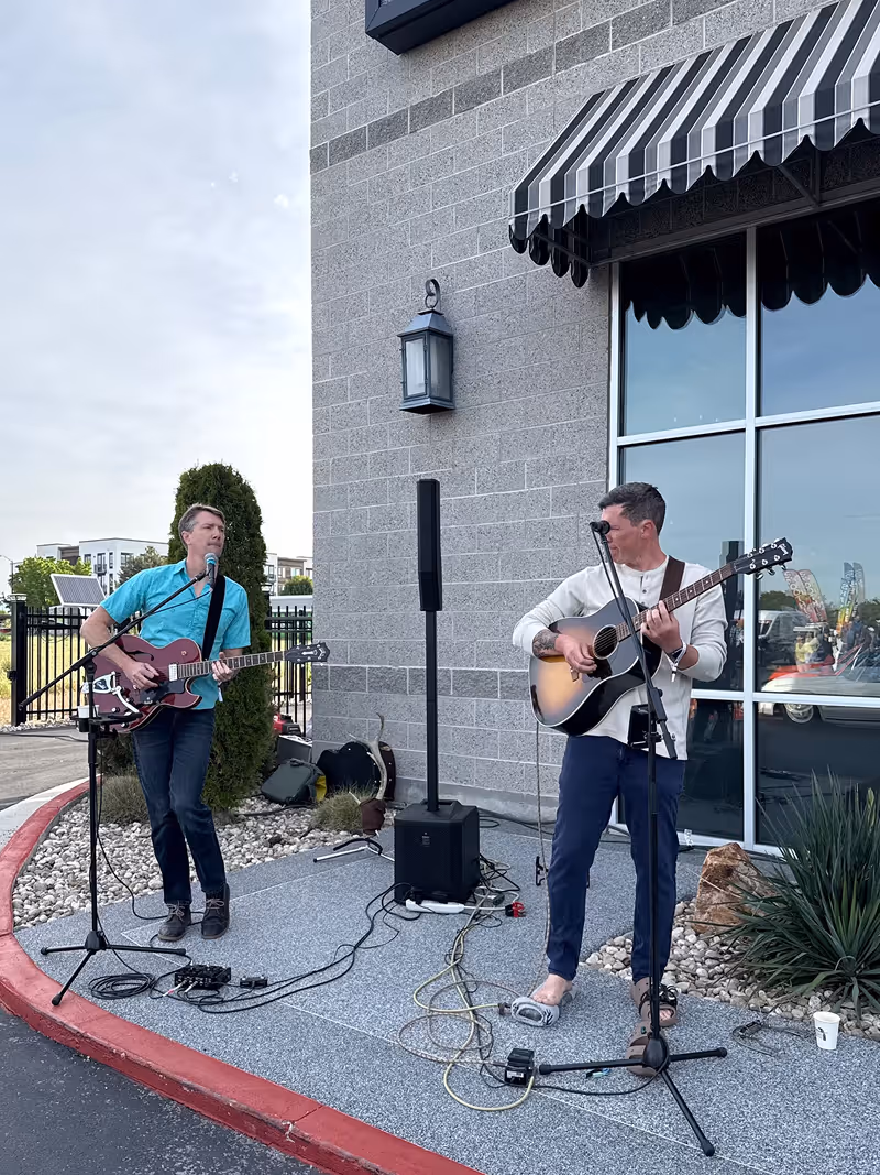 Live music performance at Idaho Air & Coffee, an air-cooled Porsche Cars & Coffee event in Idaho.