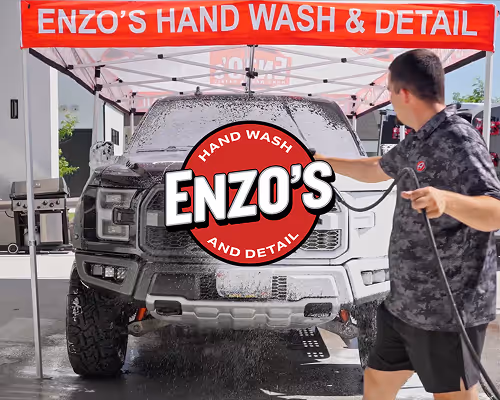 Enzo’s hand car wash and detailing service in action.