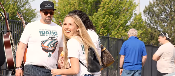 Guest wearing Idaho Air & Coffee shirt at Porsche meetup
