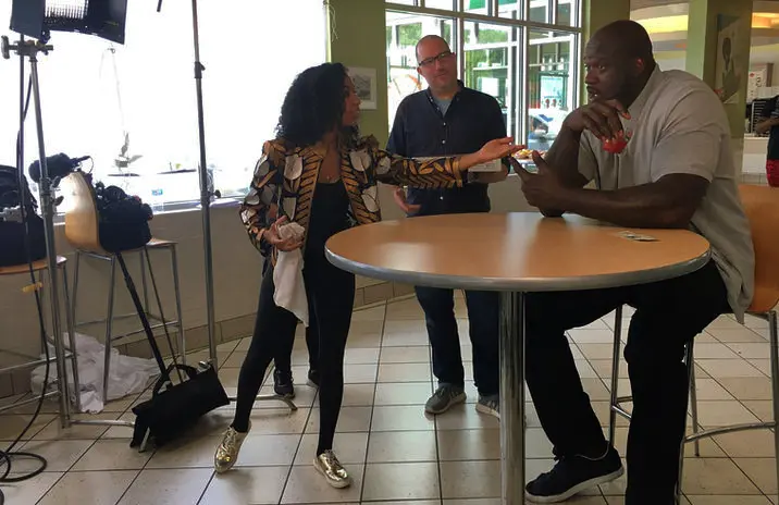 Chelsea and Shaq making a commercial.