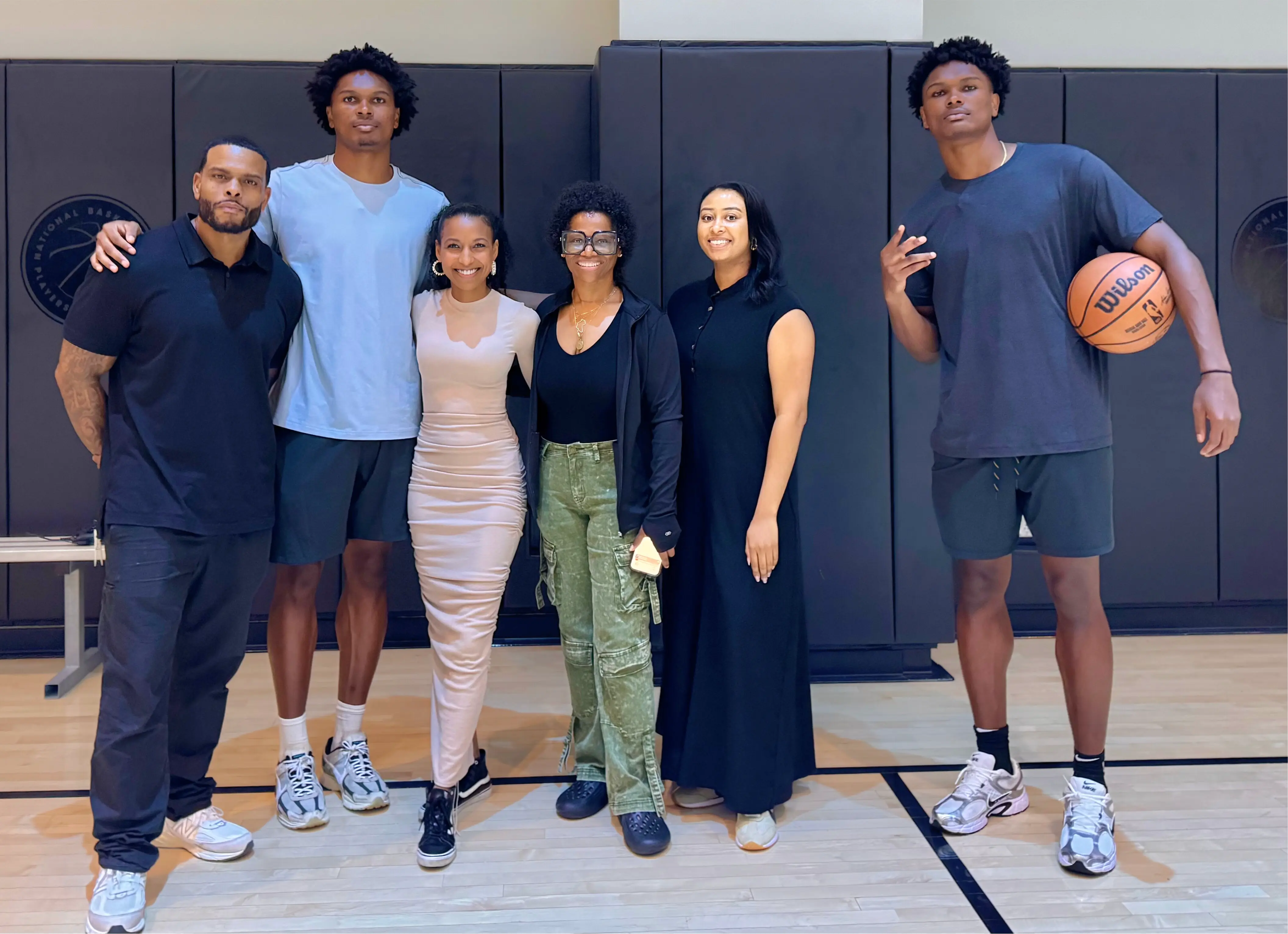 Chelsea, the Test Tube team, and the Thompson Twins post a successful Amex shoot.