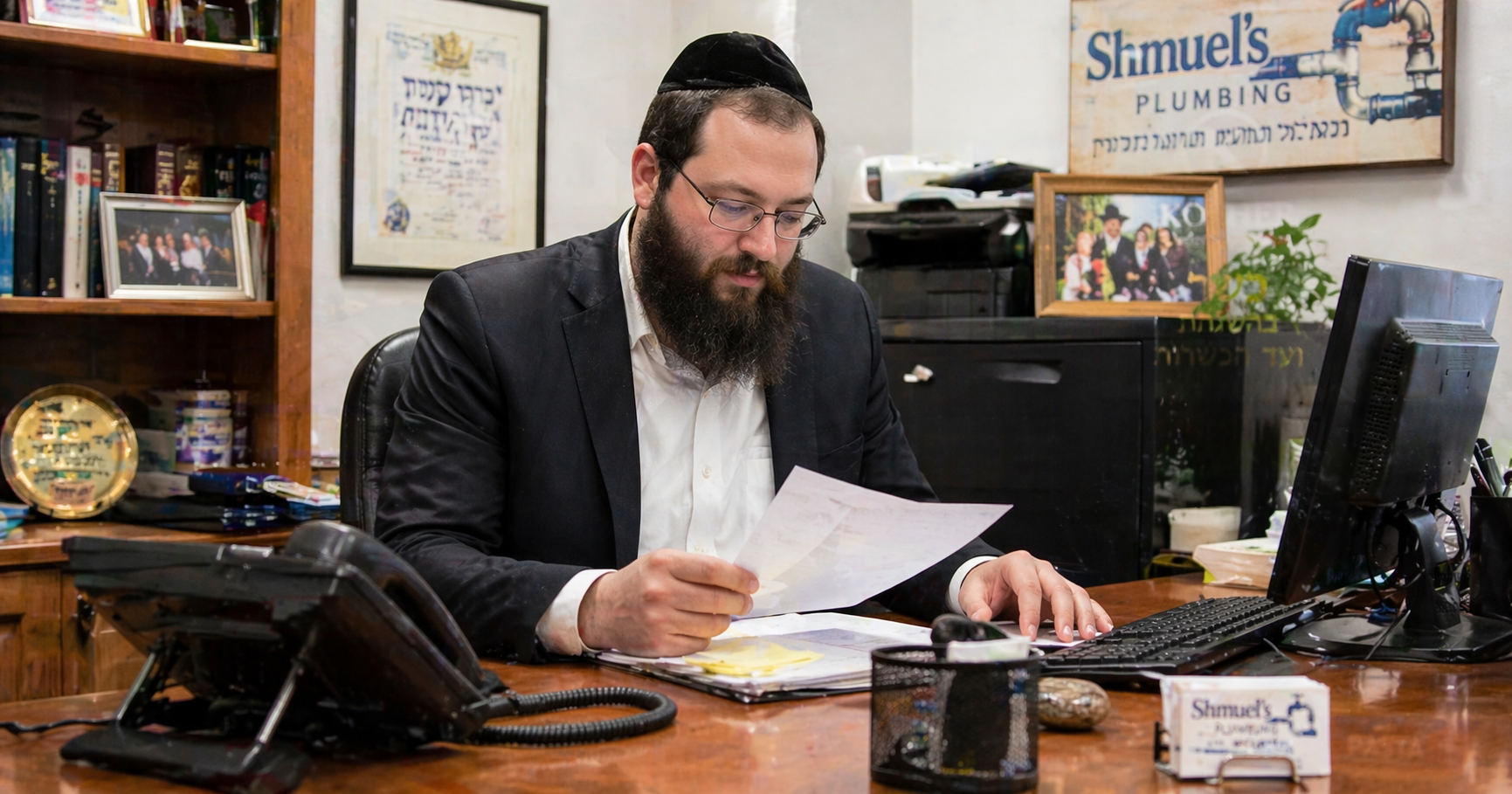 Orthodox Jewish men working in a kosher business environment