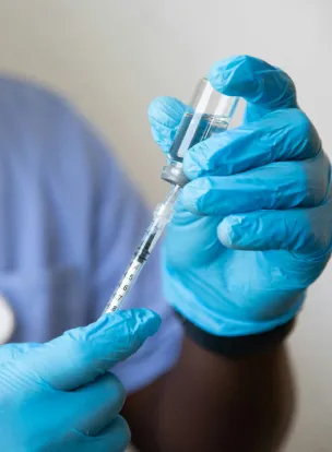 A man is holding injection