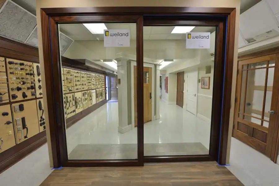 Weiland liftslide door panels stacked along a flush track