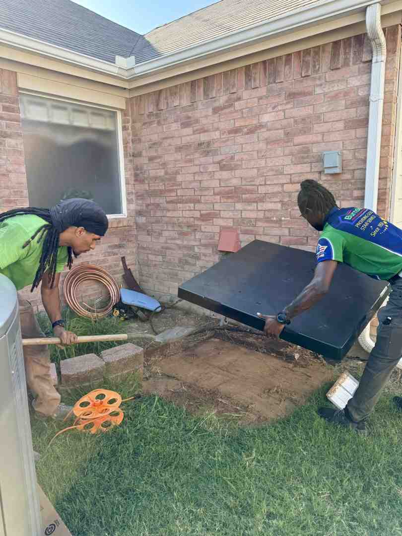 heat pump installed in North Texas backyard - heat pump benefits for homeowners