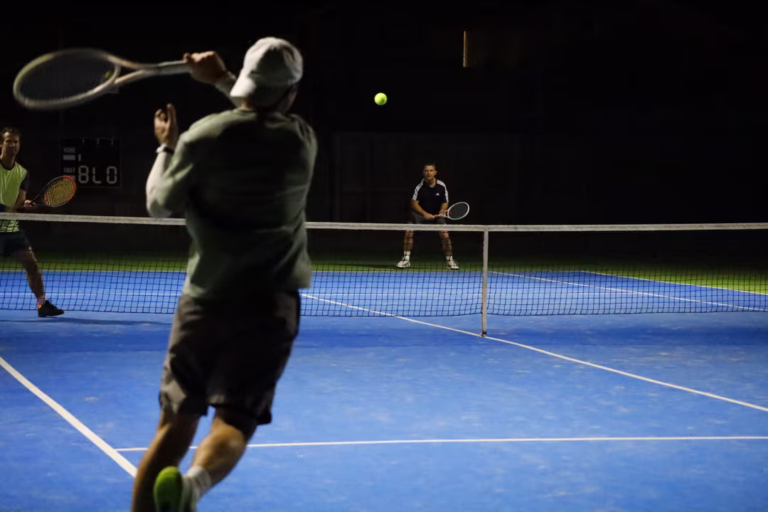 Playing tennis under the lights in winter at the Waimairi Tennis Club