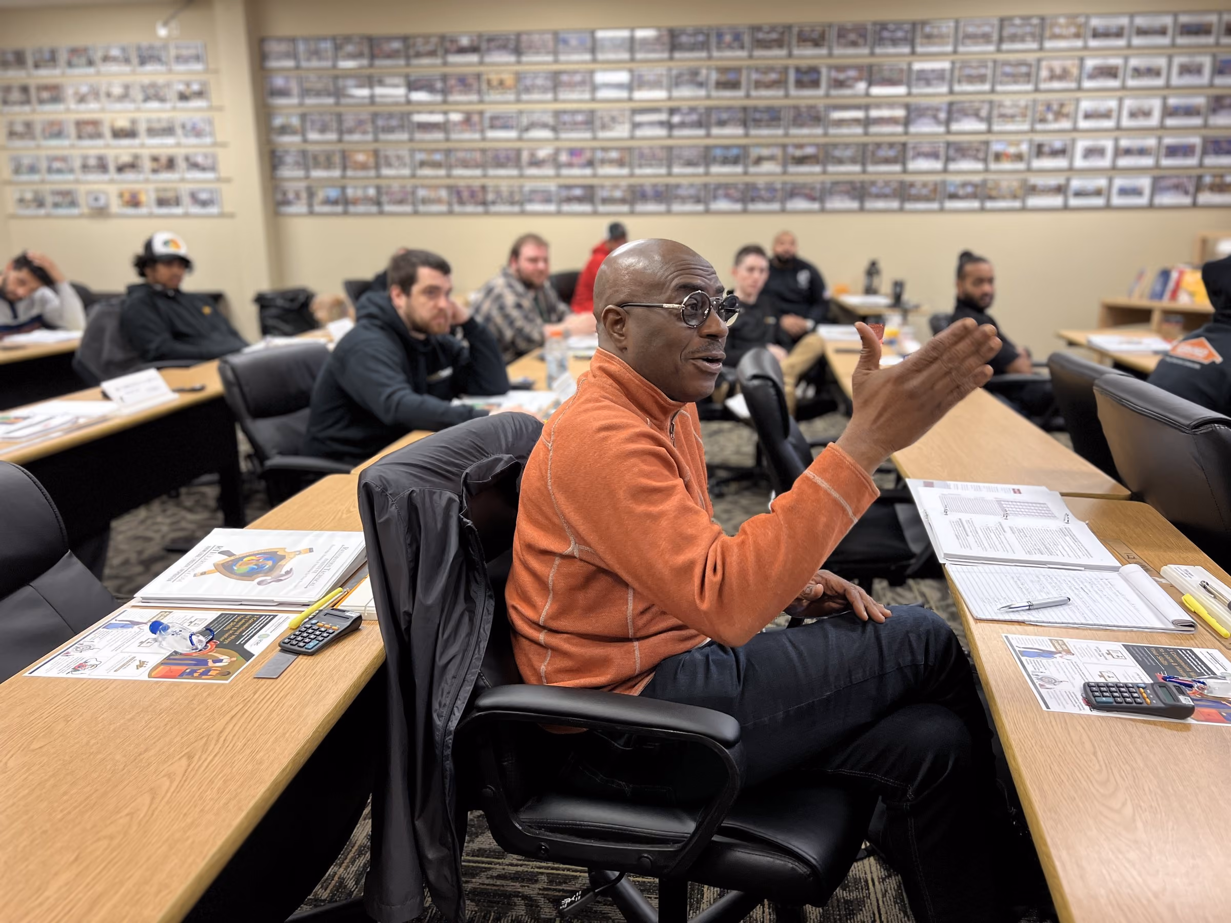 Instructor leading a restoration health-and-safety discussion in the RTI classroom