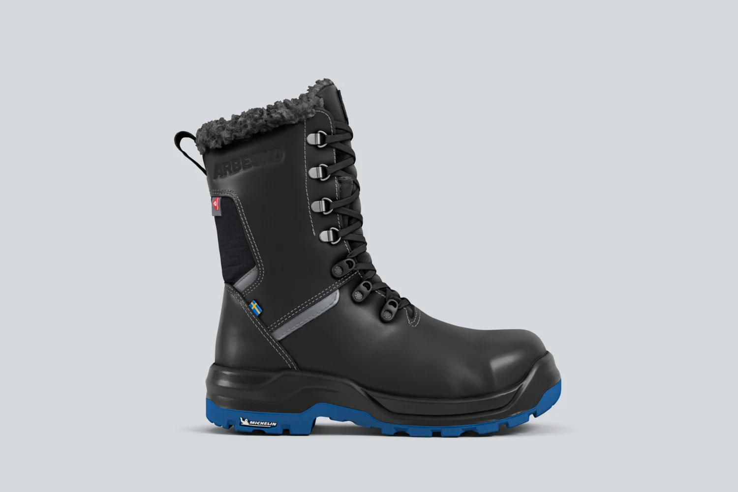 The Arbesko Kiruna 835 safety boot with three marked points: the midsole, the upper above the toe and the outsole.