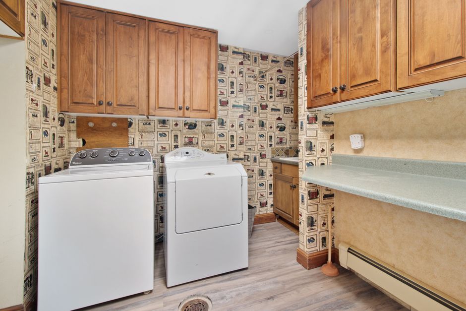 Custom laundry cabinets and folding station Custom laundry cabinets and folding station
