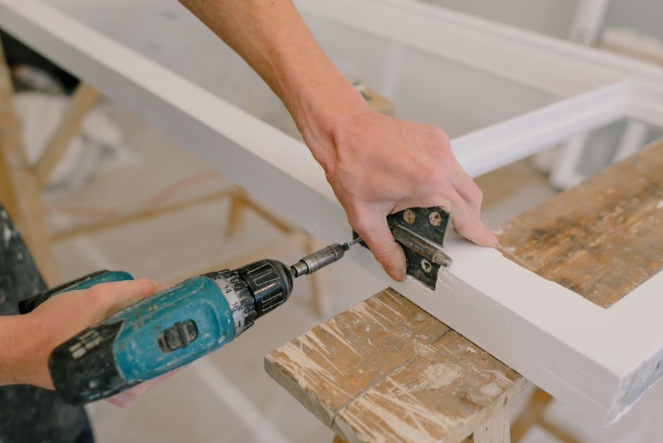 Professional roofer installing a skylight frame - average skylight cost